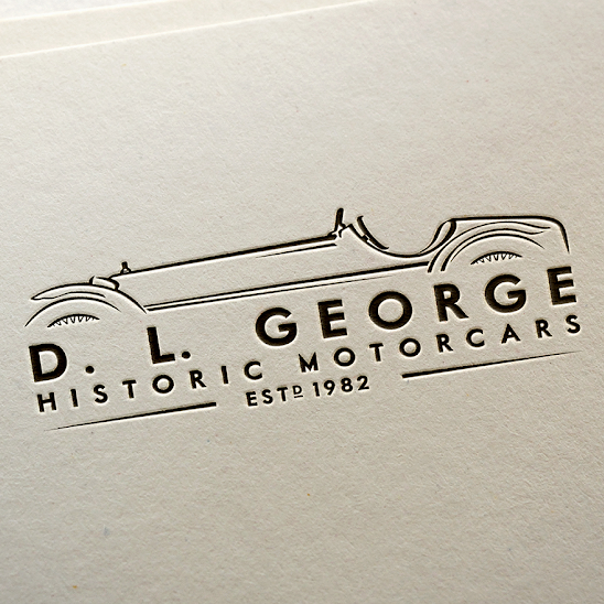  Логотип для исторических автомобилей D. L. George 